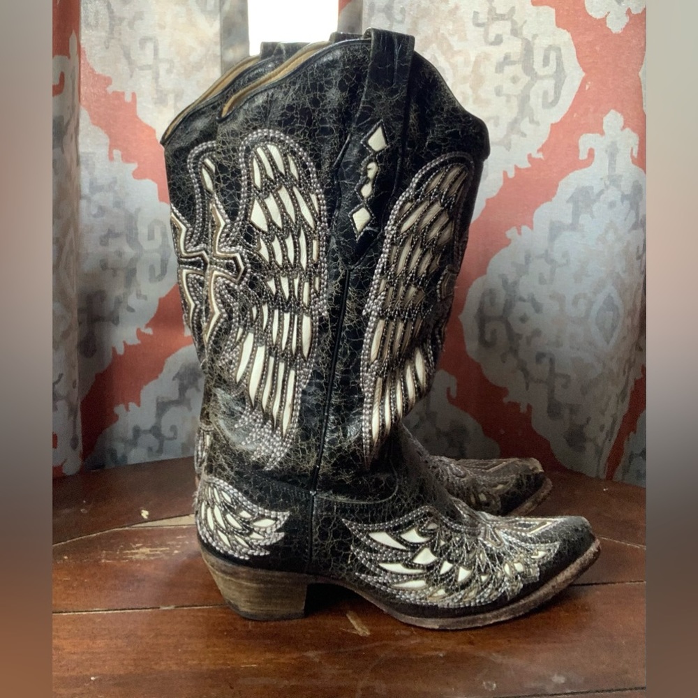 Black and white corral cross boots